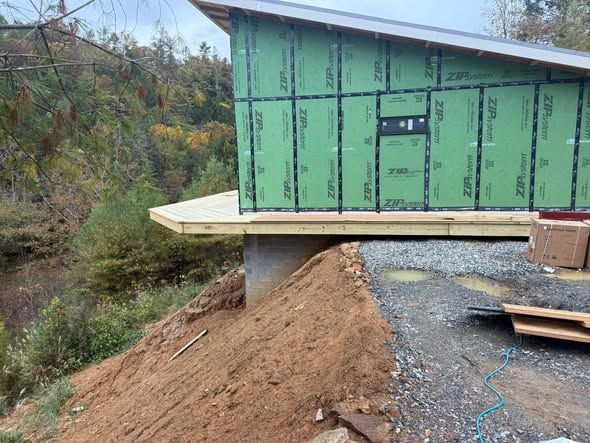 Cantilevered bump-out framed and sheathed