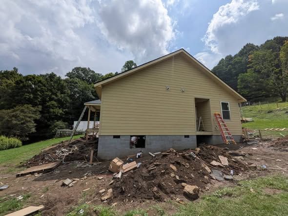 House with completed siding and trim