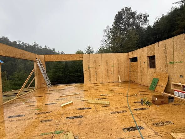 Exterior walls going up on a new subfloor